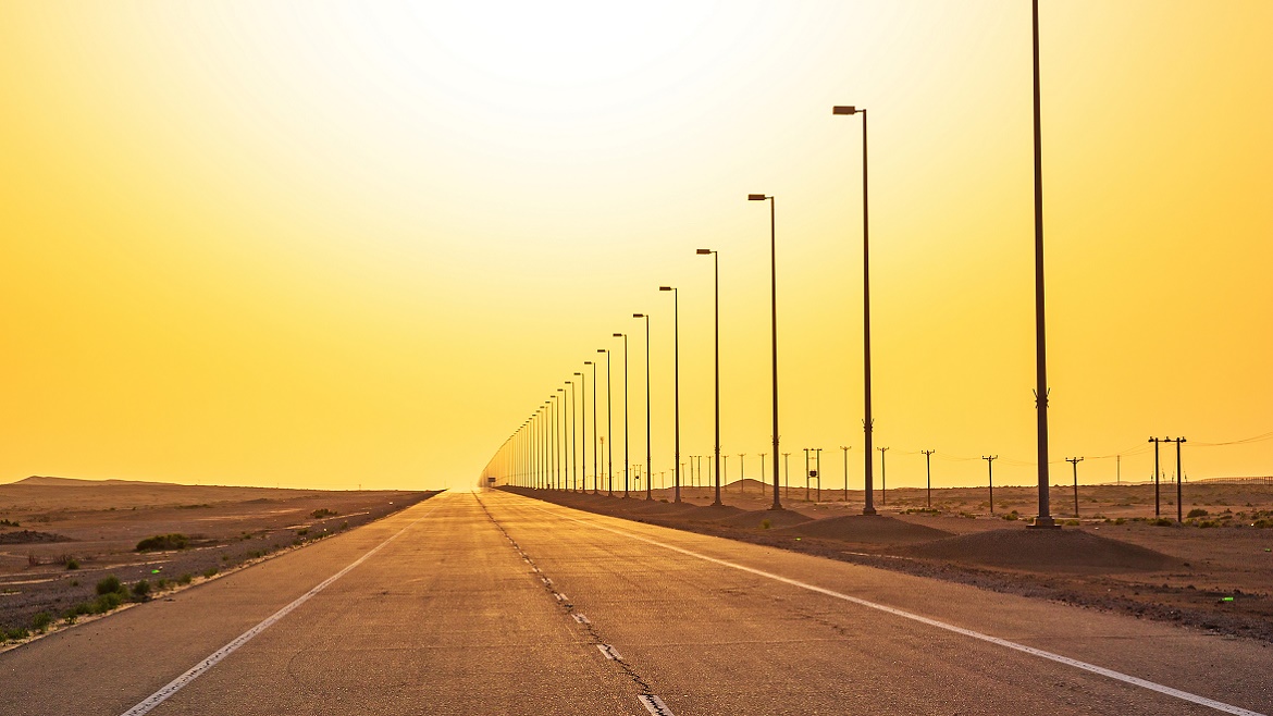 A study in sand_empty road desert sunset