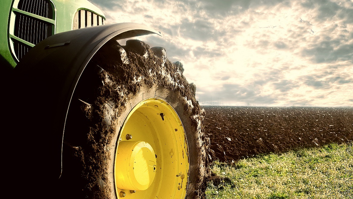 Better Protection Against Yellow Buckets_tractor tire closeup